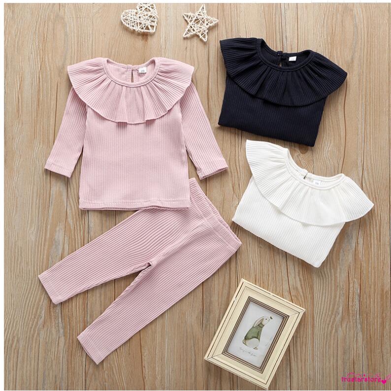 Bộ áo thun tay dài cổ cánh sen cùng quần ống dài trơn màu dành cho các bé gái