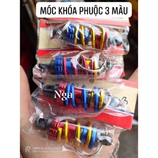 Móc khoá phuộc 3 màu hình giảm sóc