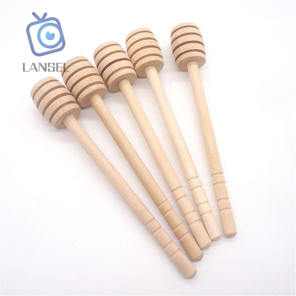 Que khuấy mật ong bằng gỗ với cán dài tiện dụng