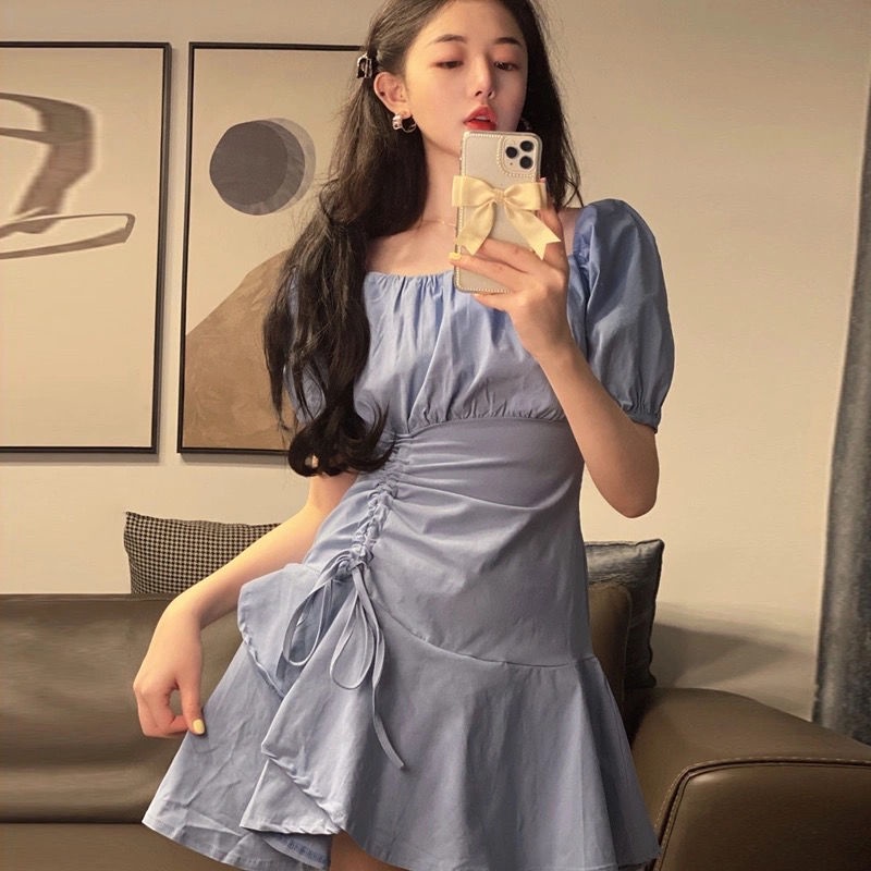 Đầmtrắng xếp ly phối dây rút thiết kế lệch tà cá tính thời trang