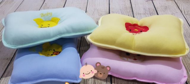 Gối lõm sơ sinh hình thú cho bé