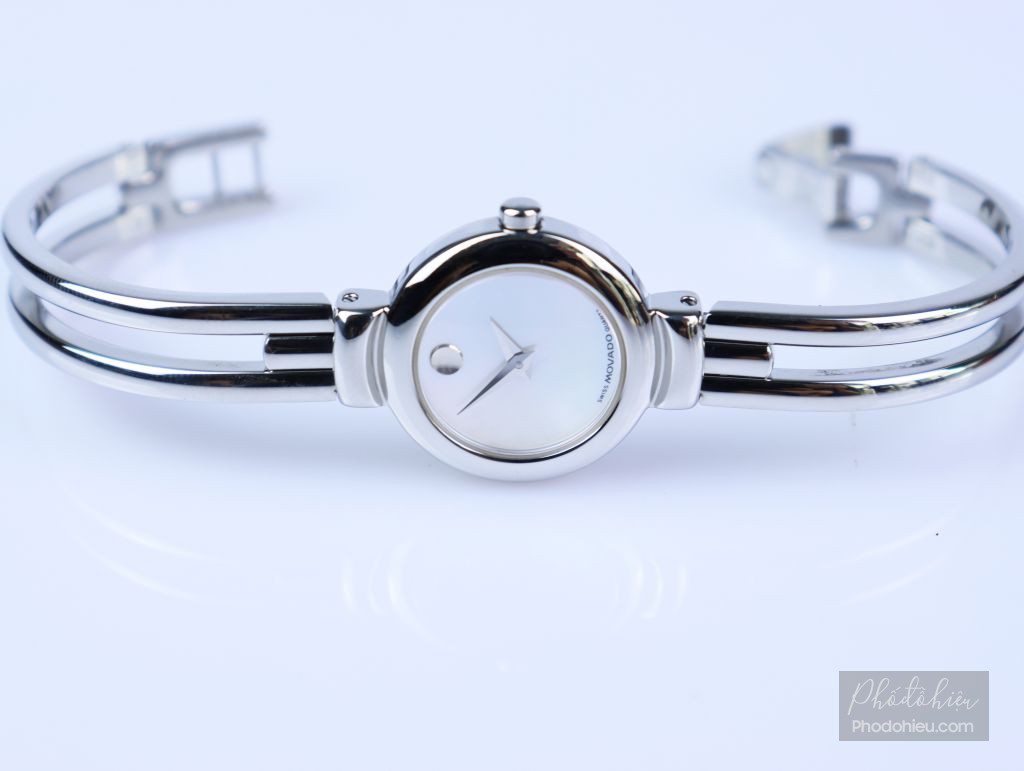 Đồng hồ nữ Movado chính hãng kiểu còng tay thép nguyên chiếc mặt xà cừ hồng