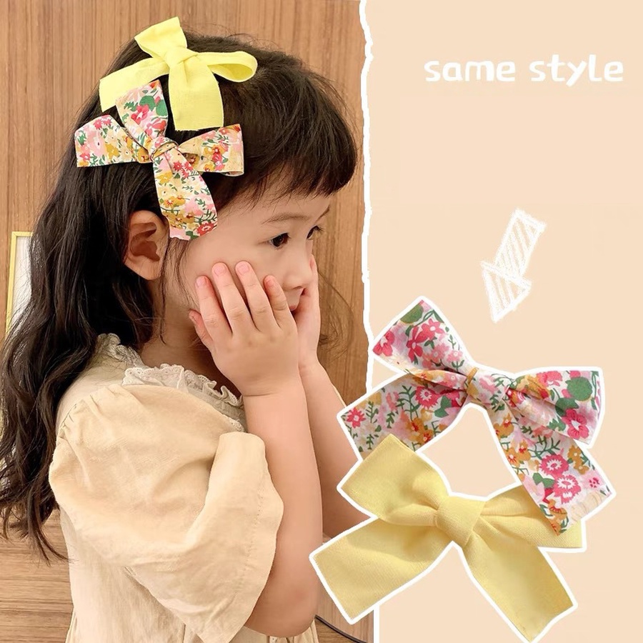 (Bán Buôn Sỉ) Set 2 Kẹp Tóc Nơ Chấm Bi Cho Bé Gái