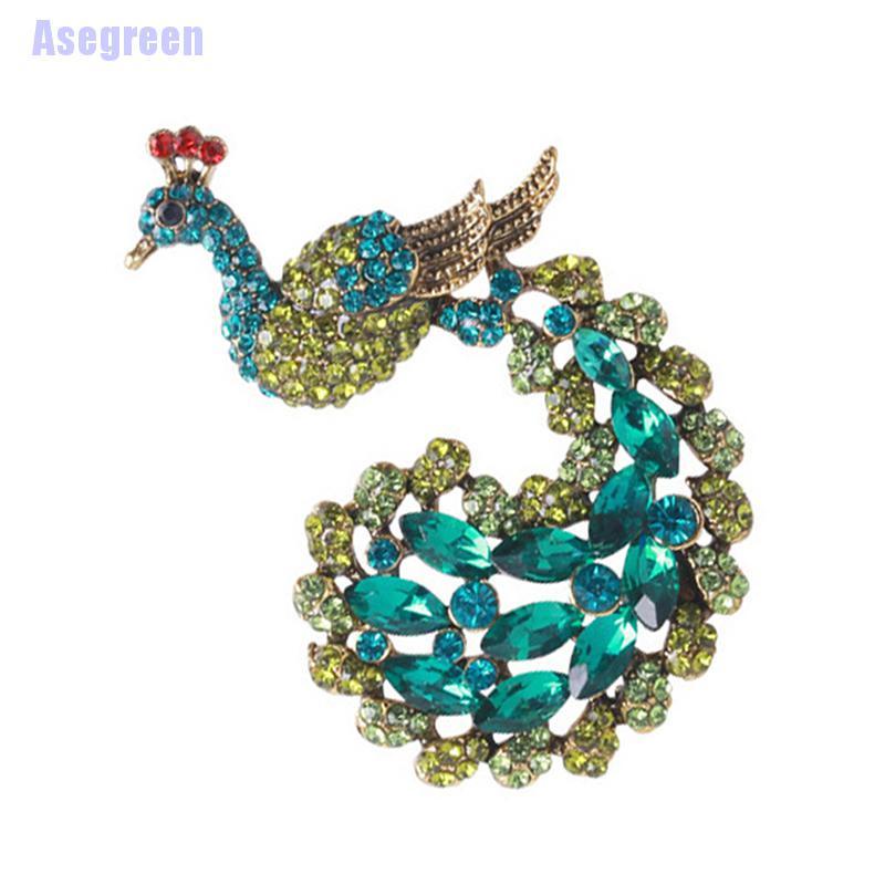 Ghim cài áo hình chim công đính đá xanh lá thời trang
