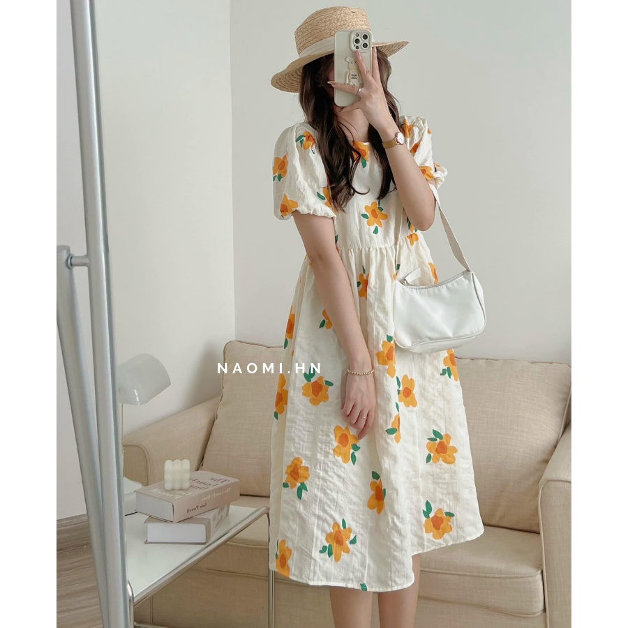 Váy babydoll dáng dài hoa vàng 2 lớp chất xốp bồng bềnh có dây buộc eo. Đầm dáng dài tay bồng babydoll hoa vàng