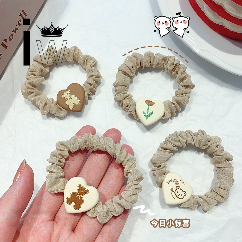 Thun cột tóc dễ thương cho nữ