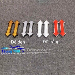 Mắt mèo phản quang mũi tên dán phuộc.