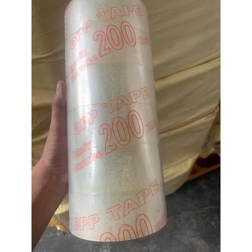 Băng keo trong 200y như hình 1 cây 6 cuộn nặng 1,7kg nhiều keo độ dính cao dẻo dai...!