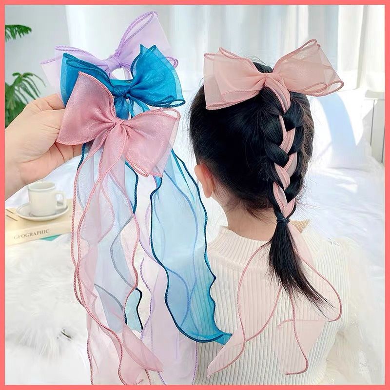 Cài tóc đính nơ dễ thương cho bé gái