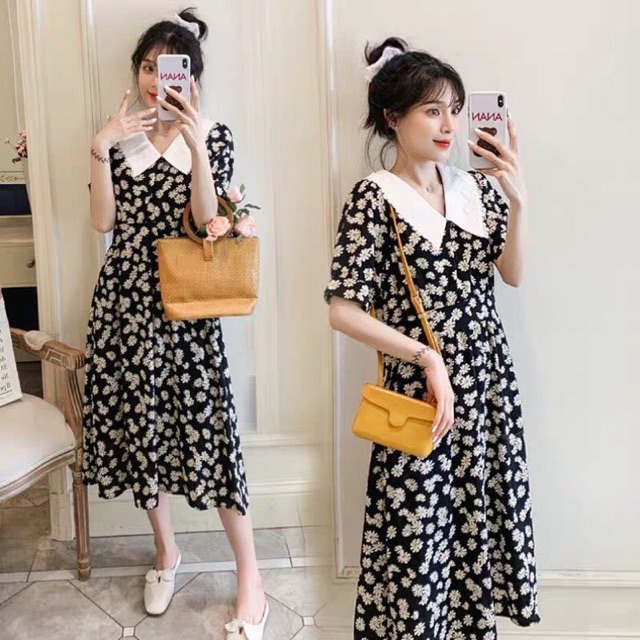 Váy von hoa cúc phối cổ HSN086