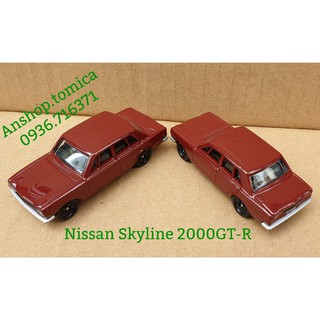 Mô hình xe Nissan màu đỏ đô tomica Nhật Bản