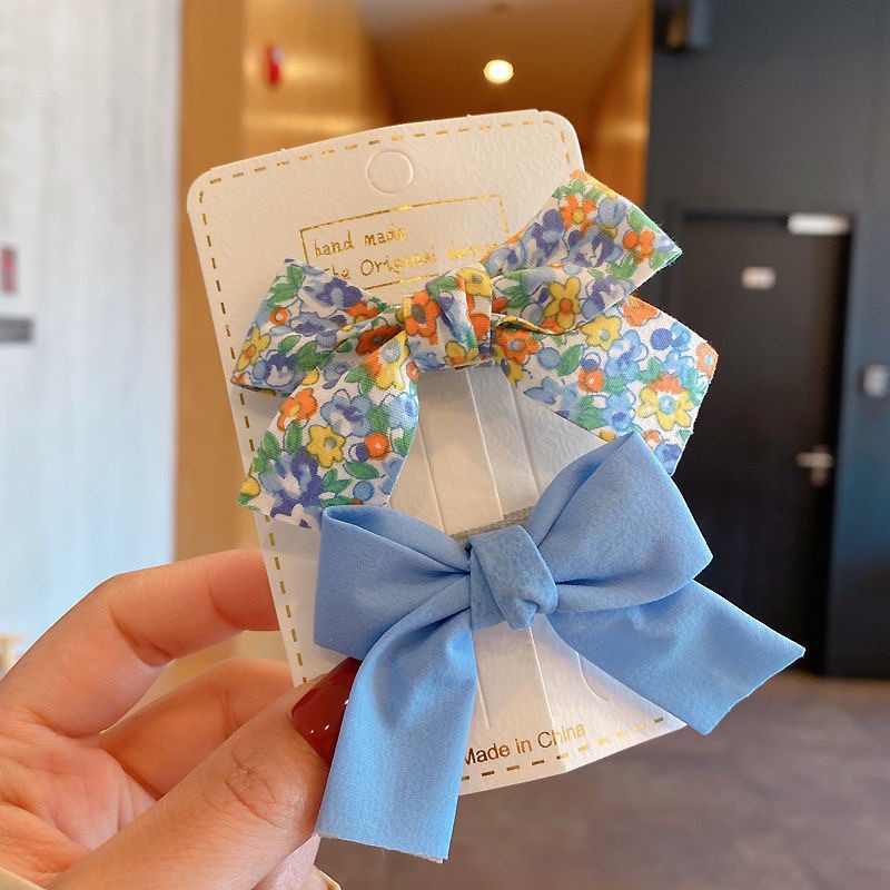 Kẹp tóc nơ AMILA họa tiết hoa xinh xắn dễ thương cho bé gái