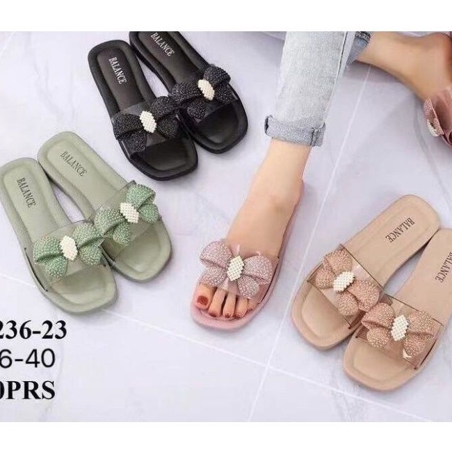 Dép nữ quai ngang đế nhựa dẻo mềm êm chân có gắn nơ dễ thương.