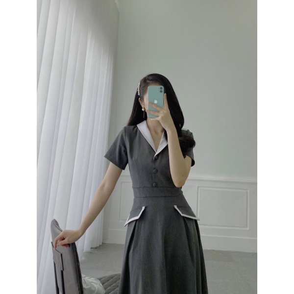 Đầm xoè cổ vest đính nút tay con