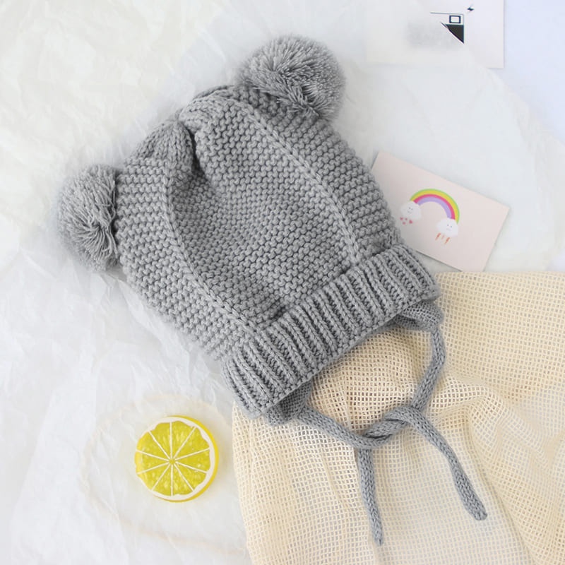Mũ dệt kim mềm mại thiết kế hình tai thỏ phối quả bóng lông xù ấm áp màu trơn thiết kế dễ thương cho bé