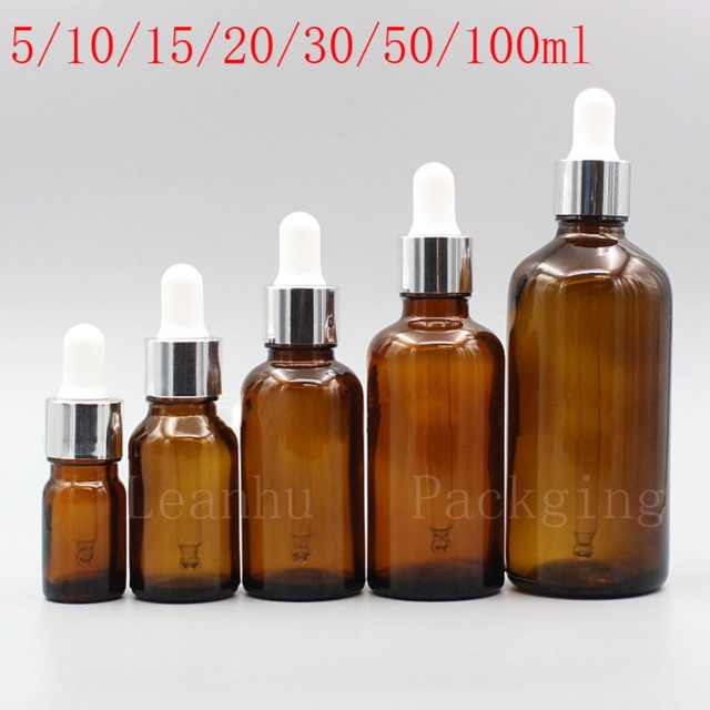 100 chai tinh dầu nâu 10ml ( bóp trắng khoen bạc bóng )