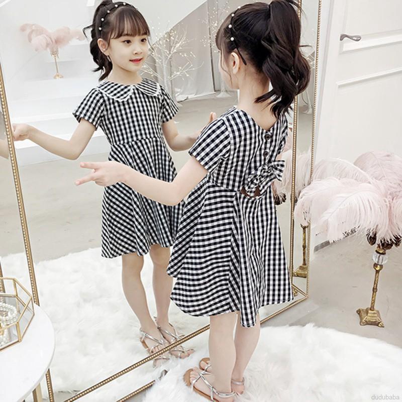 Đầm caro đính nơ sau lưng hở lưng tay ngắn thời trang đáng yêu cho bé gái 3-12t