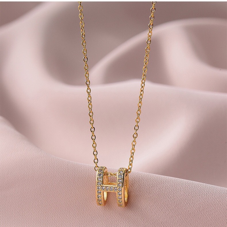 [Không đen gỉ] Dây chuyền thép titan mạ vàng mặt chữ H đính đá TB530