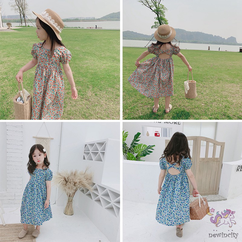 Đầm hoa hở lưng cho bé gái