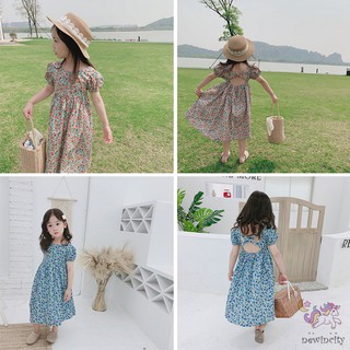 Đầm hoa hở lưng cho bé gái
