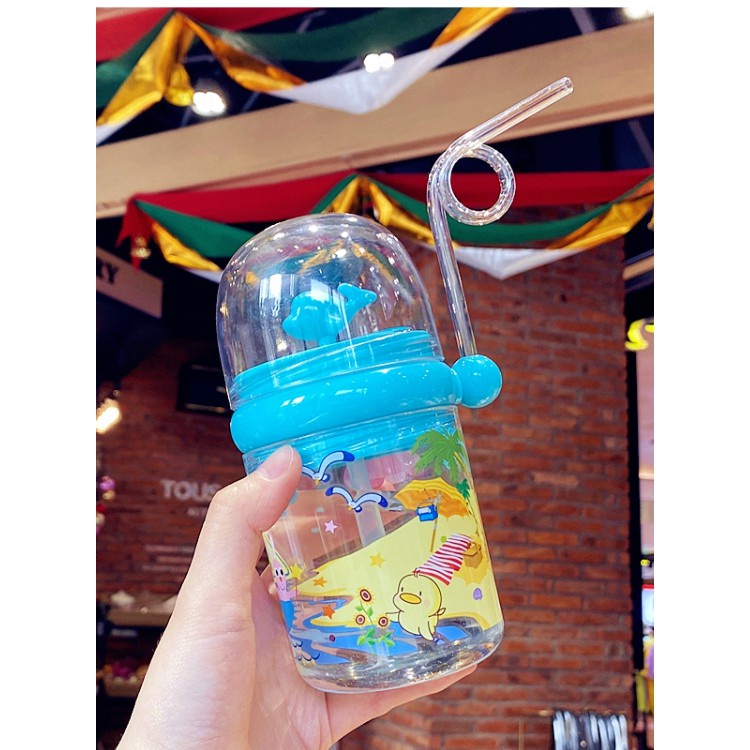 Bình Dụ Bé Uống Sữa Hình Cá Heo Phun Nước