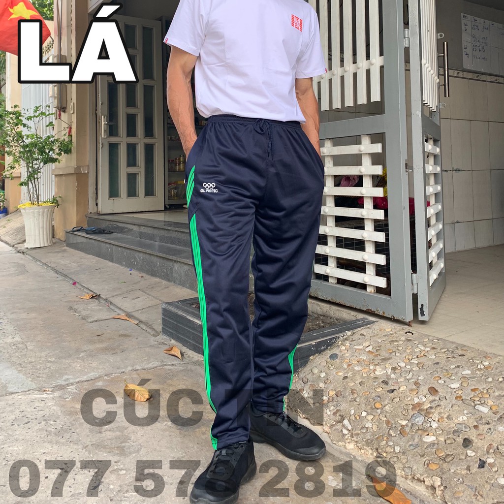 QUẦN THỂ THAO DÀI, 3 SỌC, CÓ 2 TÚI KHÓA KÉO. CÚC TIN