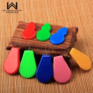 Dụng cụ xỏ chỉ  và gỡ chỉ