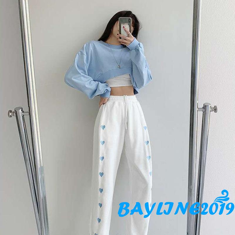 Áo thun dài tay hở rốn cổ tròn màu trơn thời trang năng động cho nữ