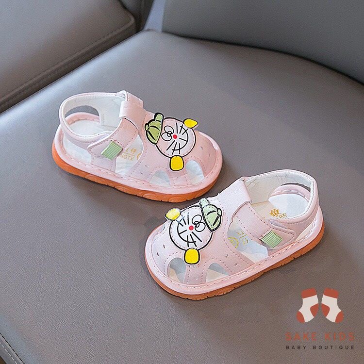 Sandal tập đi bé trai bé gái - Dép rọ có còi hình Đoremon dễ thương chống trơn trượt cho bé từ 0-1 tuổi M301