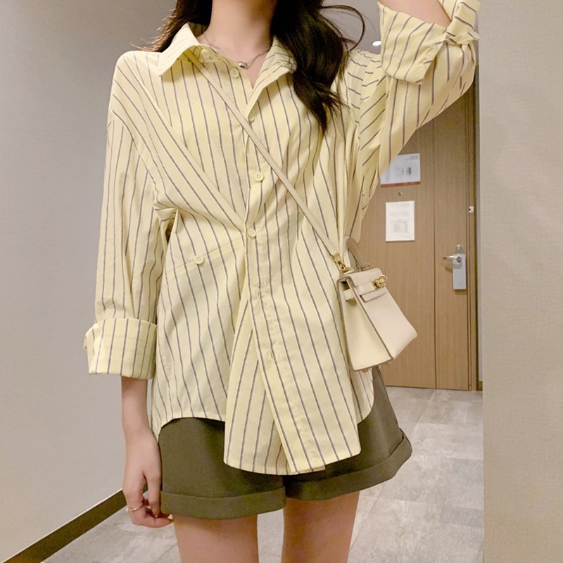 Áo sơ mi nữ kẻ sọc dài tay áo kiểu cổ bẻ vintage công sở form rộng basic vạt lệch phong cách Hàn Quốc DK1T401