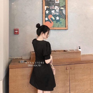 Váy đen cổ sen trắng
