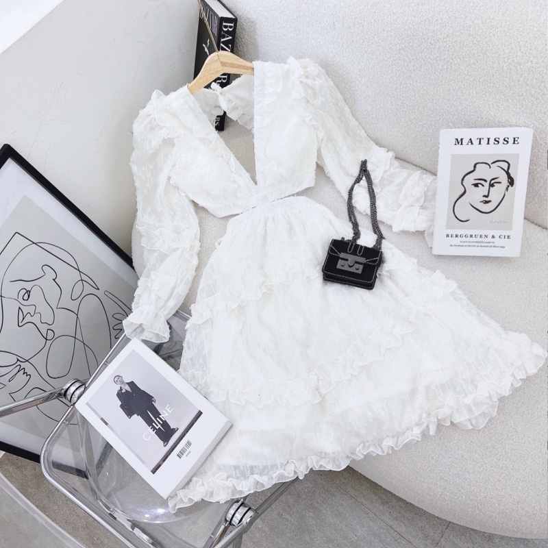 Đầm cut-out eo hở lưng lông vũ
