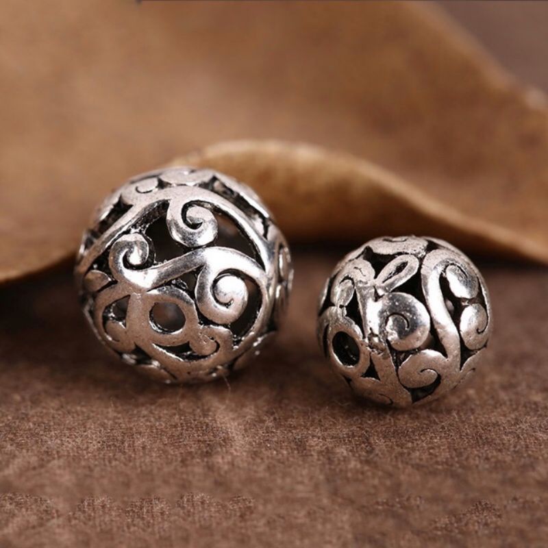 Charm bi cầu hoa văn bạc thái làm vòng