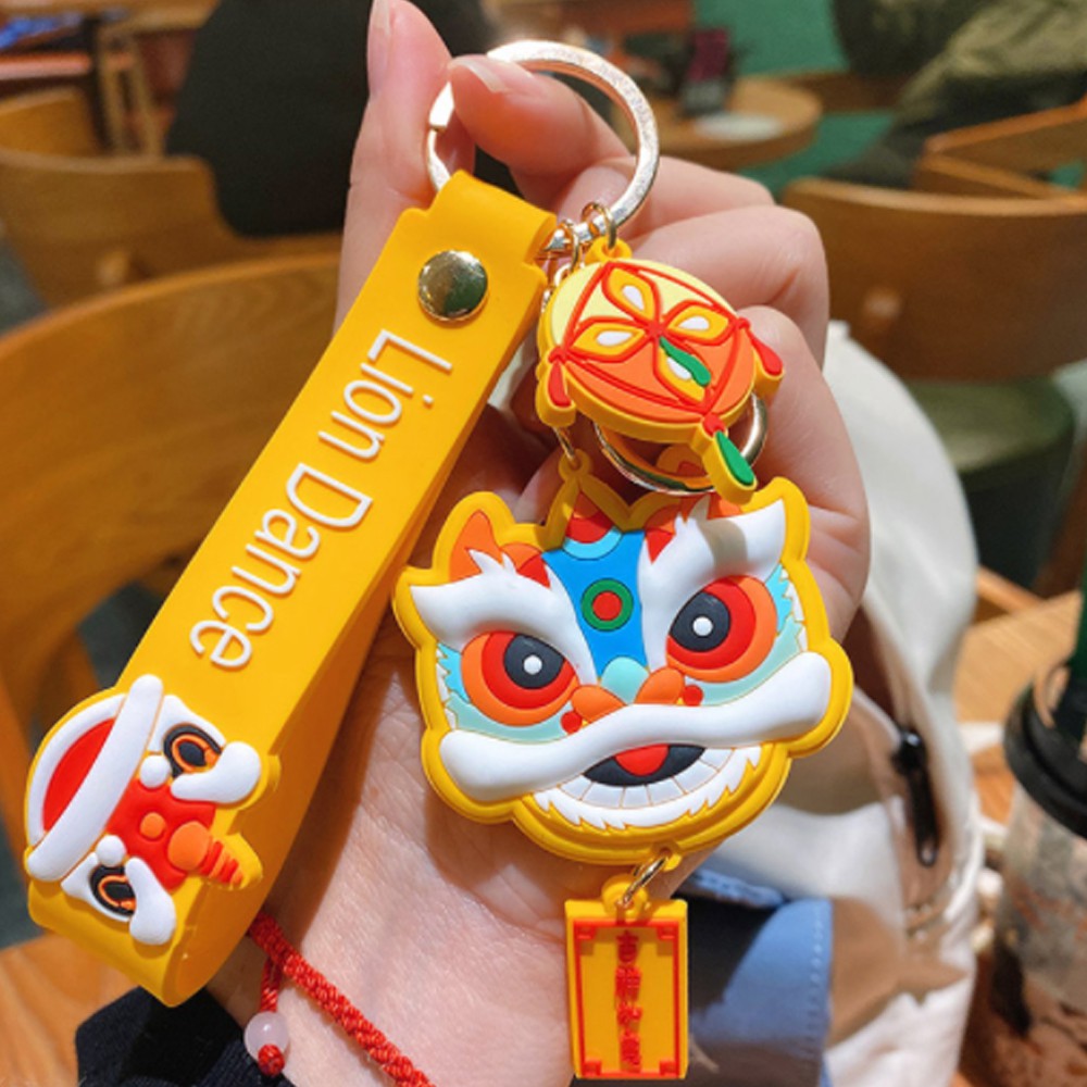 Móc khóa nhựa dẻo hình đầu Lân cá tính