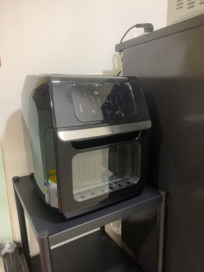 An aerial view of waves crashing against a shore.