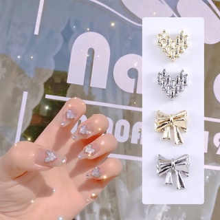 charm tim,charm nơ không có đá bán lẻ 1 cái