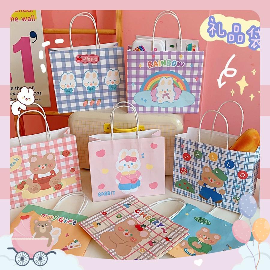 Túi giấy có quai đựng - túi đựng quà tặng in hình dễ thương