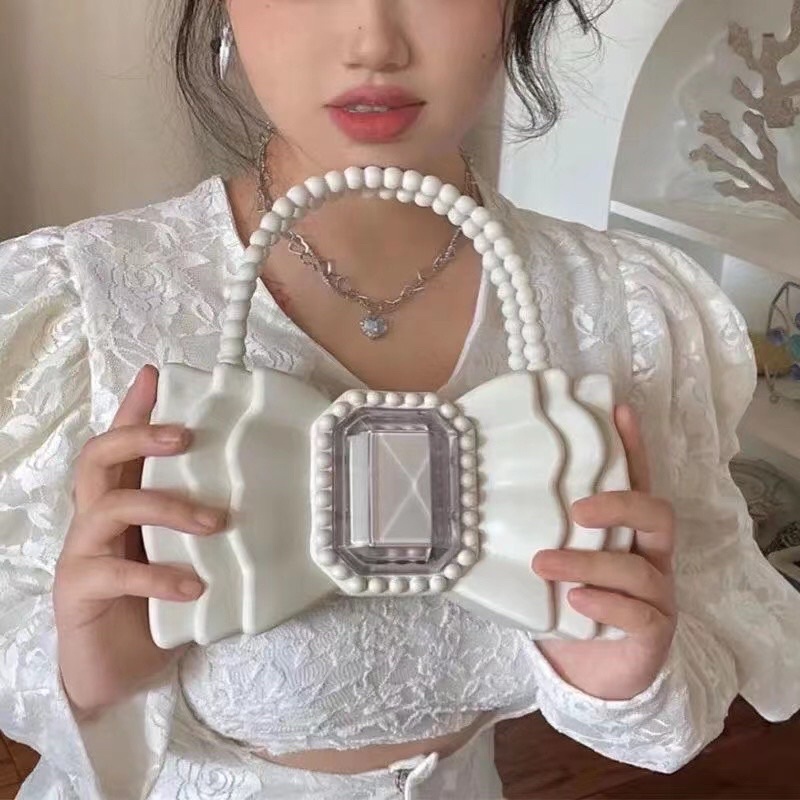 Túi xách nữ hình nơ sáng chảnh lạ mắt