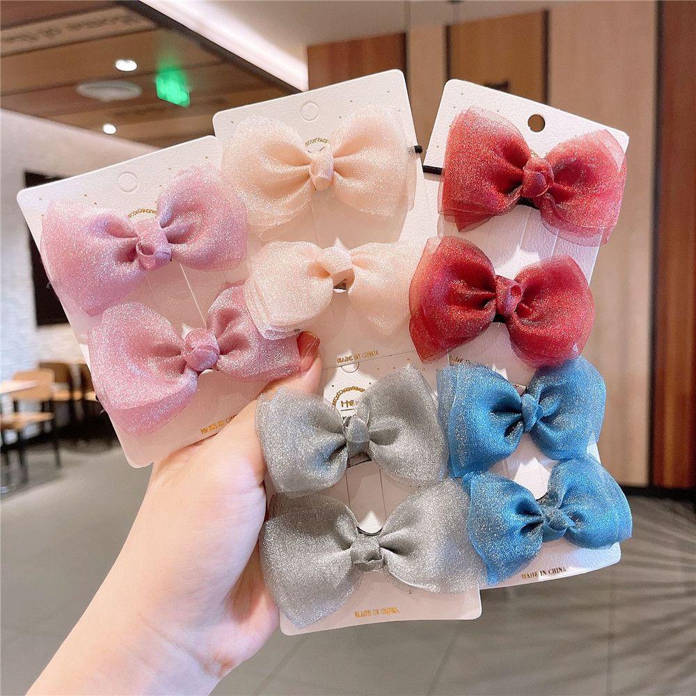 Bộ 2 Kẹp Tóc Nơ Vải Gạc Ngọt Ngào Cho Bé Gái