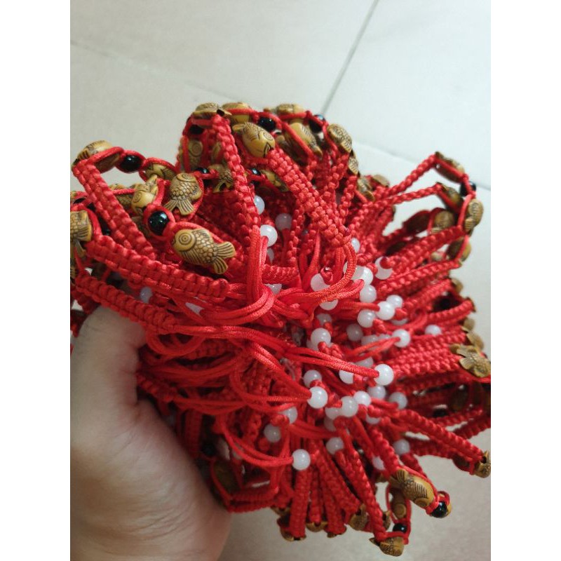 Rẻ vô địch - vòng tay chỉ đỏ dây rút cá