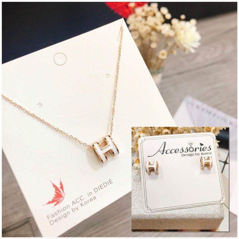 set dây chuyền và hoa tai titan
