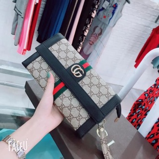 Ví cầm tay gucci nữ