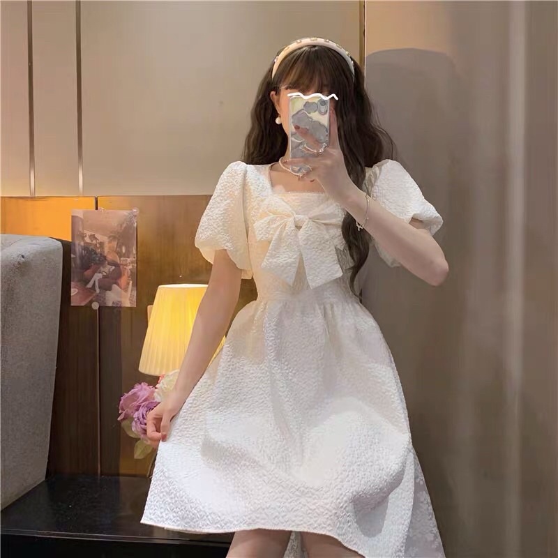 Váy xoè trắng gắn nơ to tay phồng dễ thương, đầm nữ order 2 tuần Trang Xuka