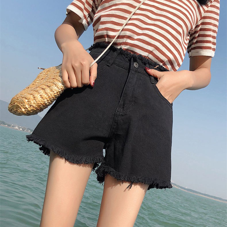 Quần short denim nữ mùa hè 2021 phiên bản Hàn Quốc mới với eo cao và gầy, sinh viên mặc quần ống rộng, hở hang