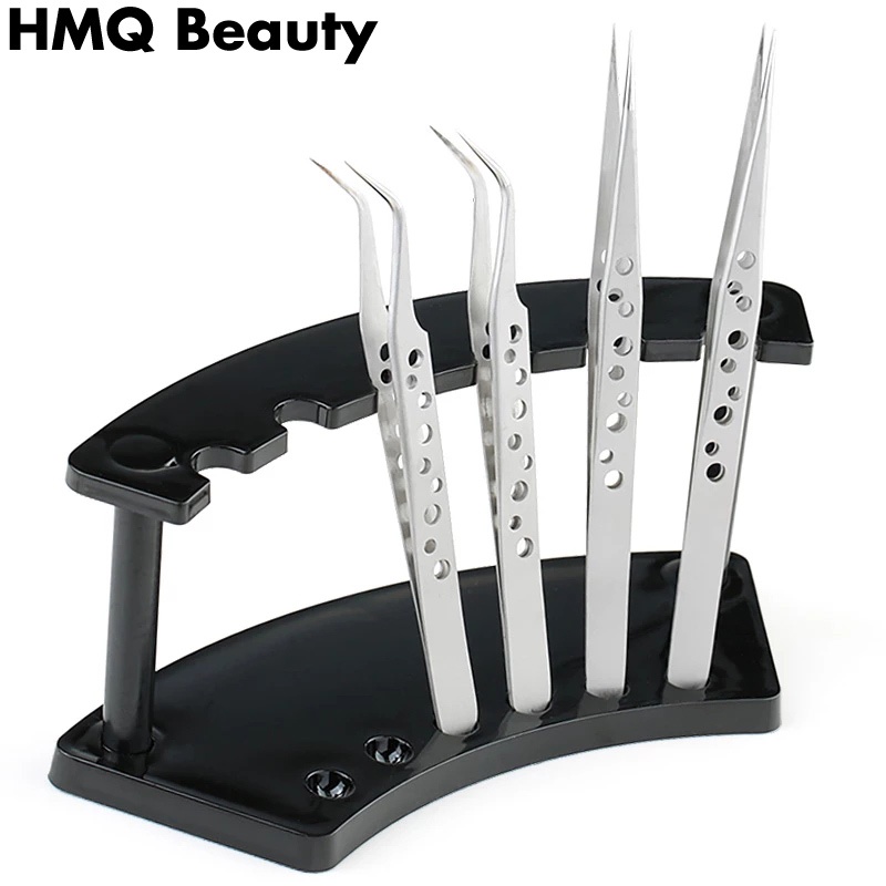 Những chiếc nhíp giữ bút vào công cụ để lashes expansion.