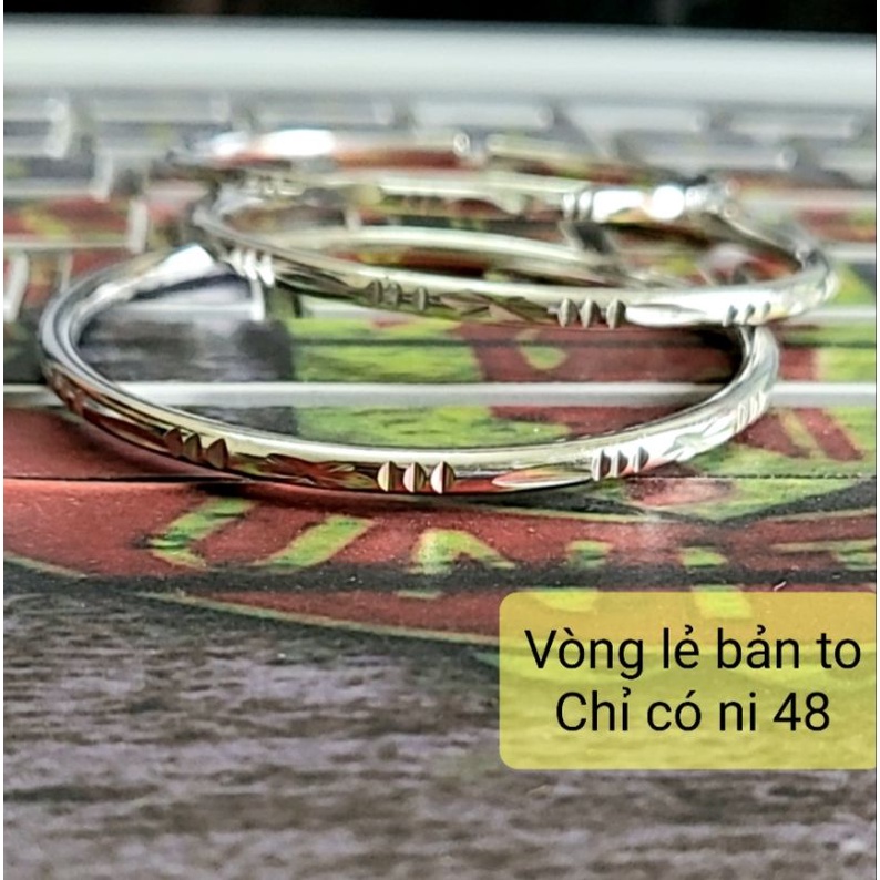 Vòng tay inox chạm khắc.