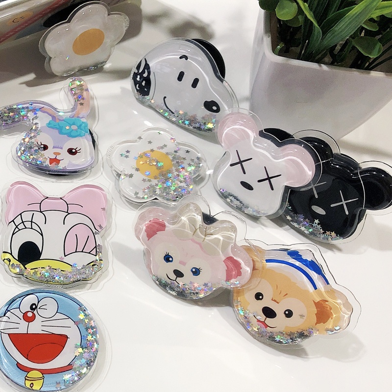 Giá đỡ điện thoại kim tuyến nước in hình Doraemon / Mickey / Minnie / Mèo / Crayon / Snoopy / vịt / Mike