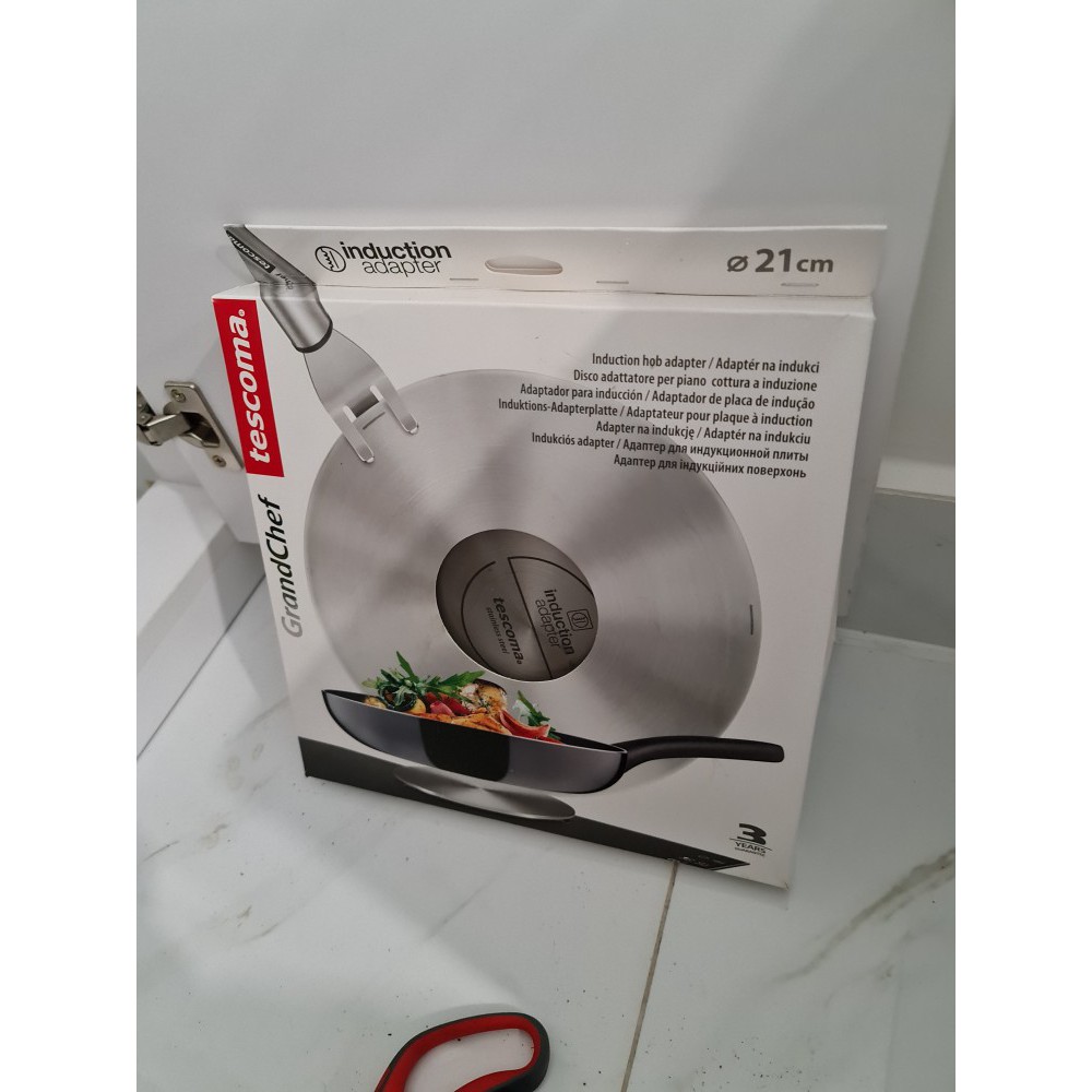 Đĩa chuyển nhiệt bếp từ Tescoma tay cầm inox