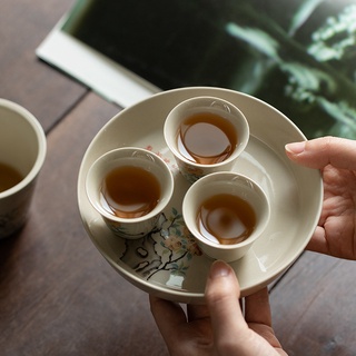 Dầm trà sứ - đĩa kê ấm chén