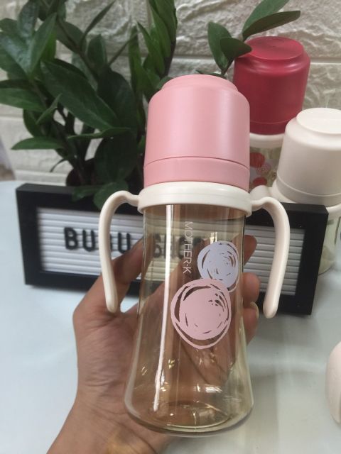 TAY CẦM BÌNH SỮA MOTHER K CHÍNH HÃNG